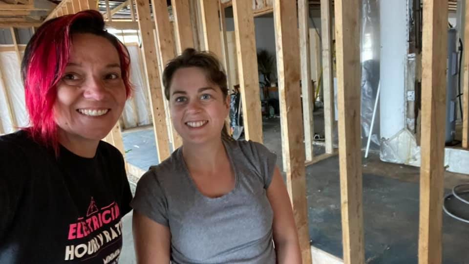 TIna Young and another female electrician on-site - commercial electrical services Greater Moncton